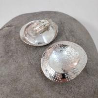 Limpet earrings  by Ann Bruford